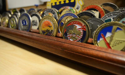 What is a challenge coin and what do they represent?